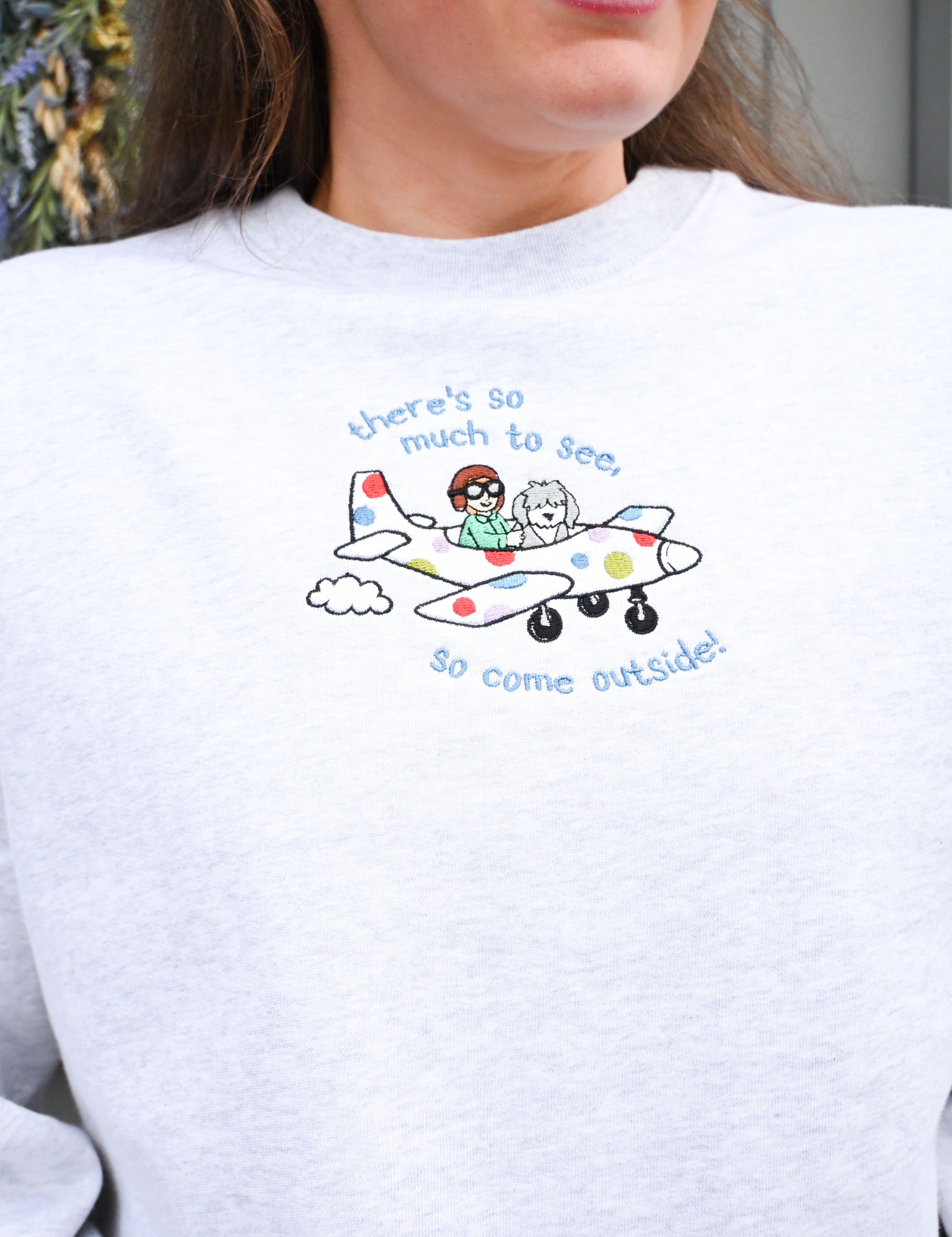 COMEOUTSIDEEMBLIGHTGREYSWEATSHIRTCLOSEUP.jpg