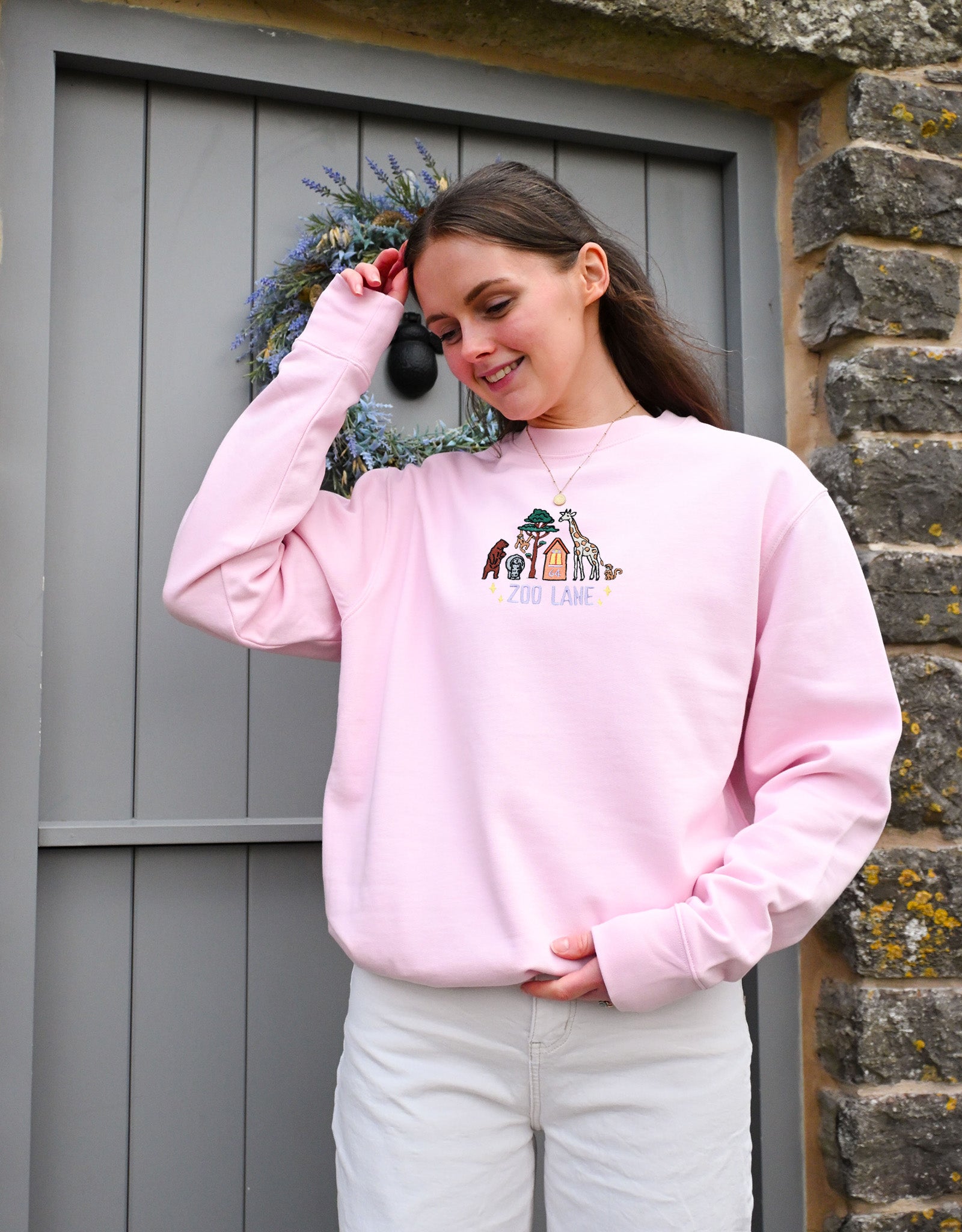 ZOOLANELIGHTPINKSWEATSHIRTFRONT2.jpg